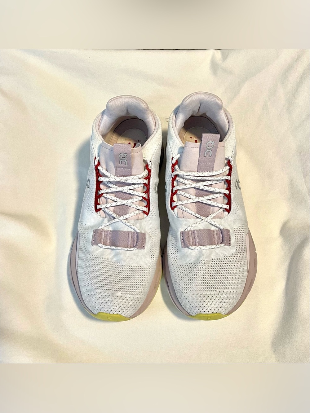 On Running White & Pink Athletic Sneakers with Red Accents